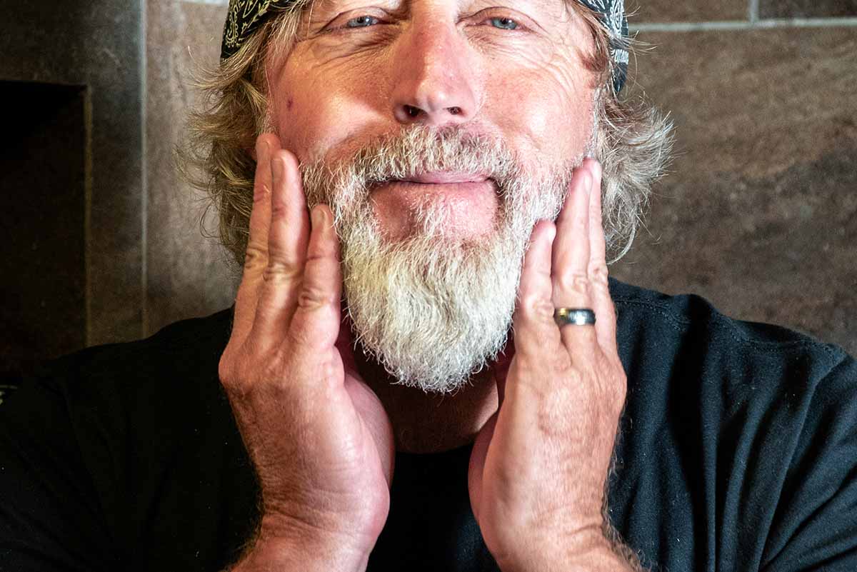 beard butter being applied to a beard