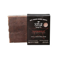 leathered up scented soap next to soap packaging